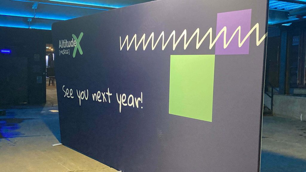 Peak AltitudeX backdrop branding