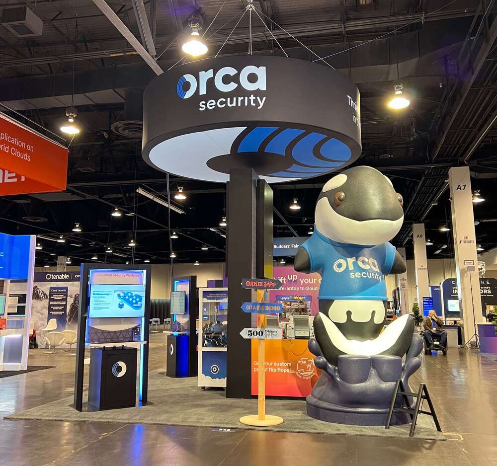 Orca mascot at booth build
